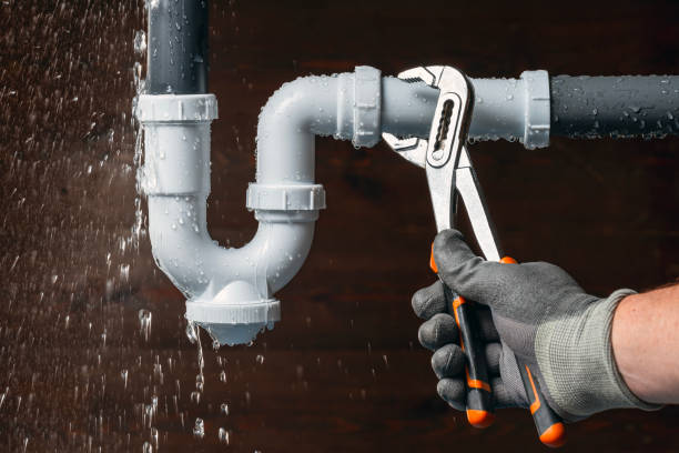 Professional Emergency Plumber technician working in Trimble, OH